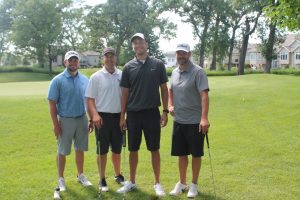 2016 Annual Lion Open Golf Classic - group photo of four Linn-Mar staff
