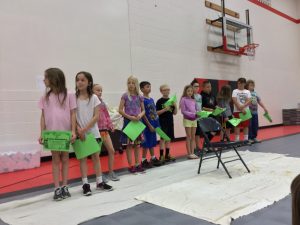 Novak Elementary Students receive perfect attendance awards in an assembly