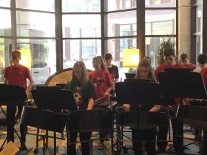 Members of the Excelsior Middle School Percussion Ensemble perform at the Iowa Bandmasters Conference in Des Moines
