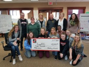 Iowa BIG is presented a check for $8000 by the Linn-Mar Foundation