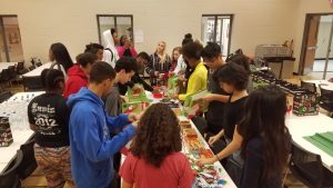 ALO sudents at Linn-Mar High School prepare Care packages for the the Marion PD