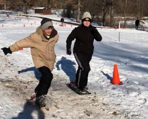 Linn-Mar Special Olympics Athletes compete in snow shoe race