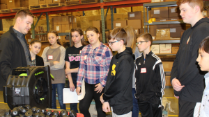 Middle school students tour local manufacturing company