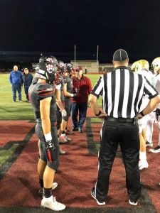 Coin Toss midfield at football game