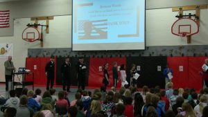 Bowman Woods students share essays at Veterans Day assembly